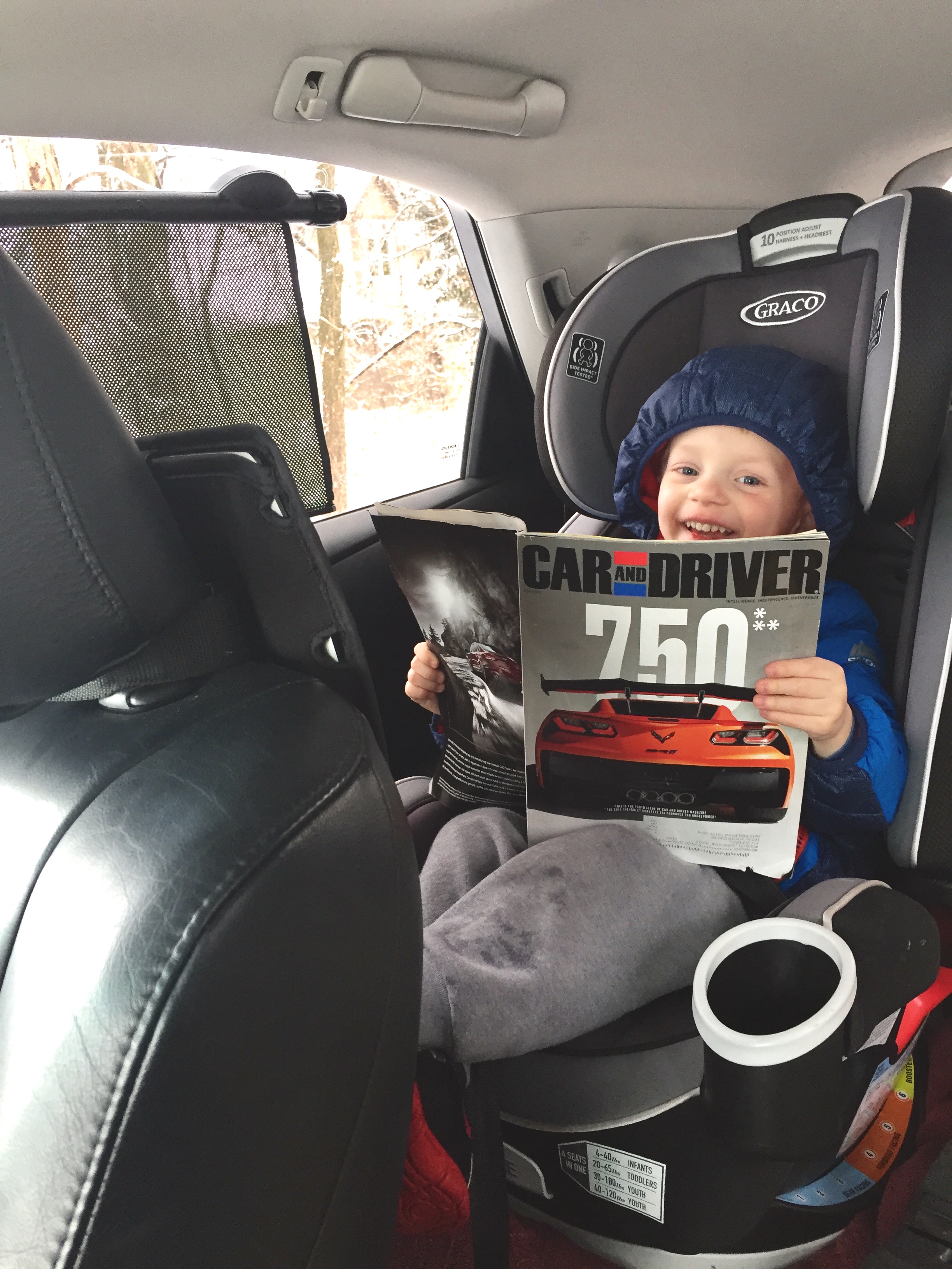 Young Alexander reading Car and Driver